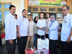 Wabup Kampar Serahkan Bantuan Kepada 47 Penyandang Disabilitas