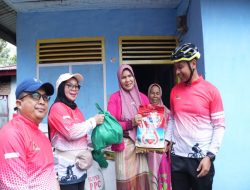 Bupati dan Wabup Salurkan Bantuan Beras dan Sembako Sambut Ramadhan Bersama Komunitas Sepeda Kampar