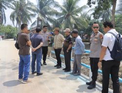 Kapolres Kampar Dampingi Bupati Kampar Cek Kesiapan Jembatan Merah Putih Presisi Menuju Peresmian