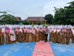 SATLANTAS POLRES KAMPAR GELAR PGTS DAN GREEN POLICING DI SMK KESEHATAN & PARIWISATA – BERI EDUKASI LALU LINTAS, BIBIT TANAMAN, DAN HELM