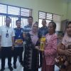 Wabup Kampar Pantau Penyaluran Bantuan Pangan di Desa Petapahan