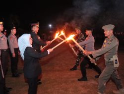 Upacara Taptu & Pawai Obor HUT RI ke-81, Semangat Kemerdekaan Berkobar di Lapangan Polres Kampar